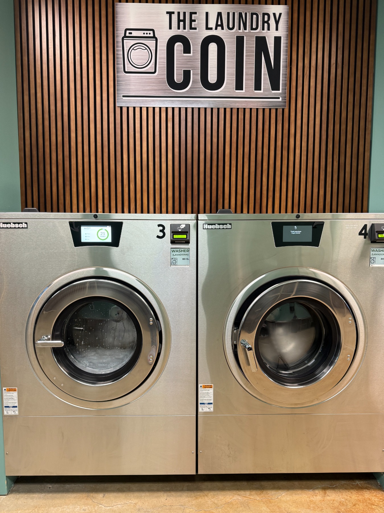 80 lb washers beneath The Laundry Coin sign